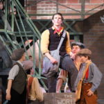 Andrew Wright and the cast of Newsies