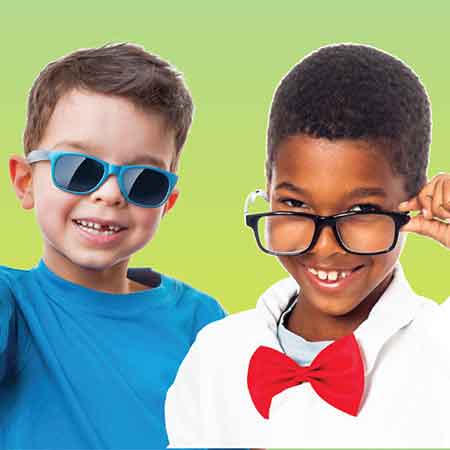 Two young boys wearing glasses