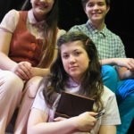Belle Rangel as Margot Frank, Otto Fox as Peter van Daan and Sophie Williams as Anne Frank in THE DIARY OF ANNE FRANK at The Rose Theater